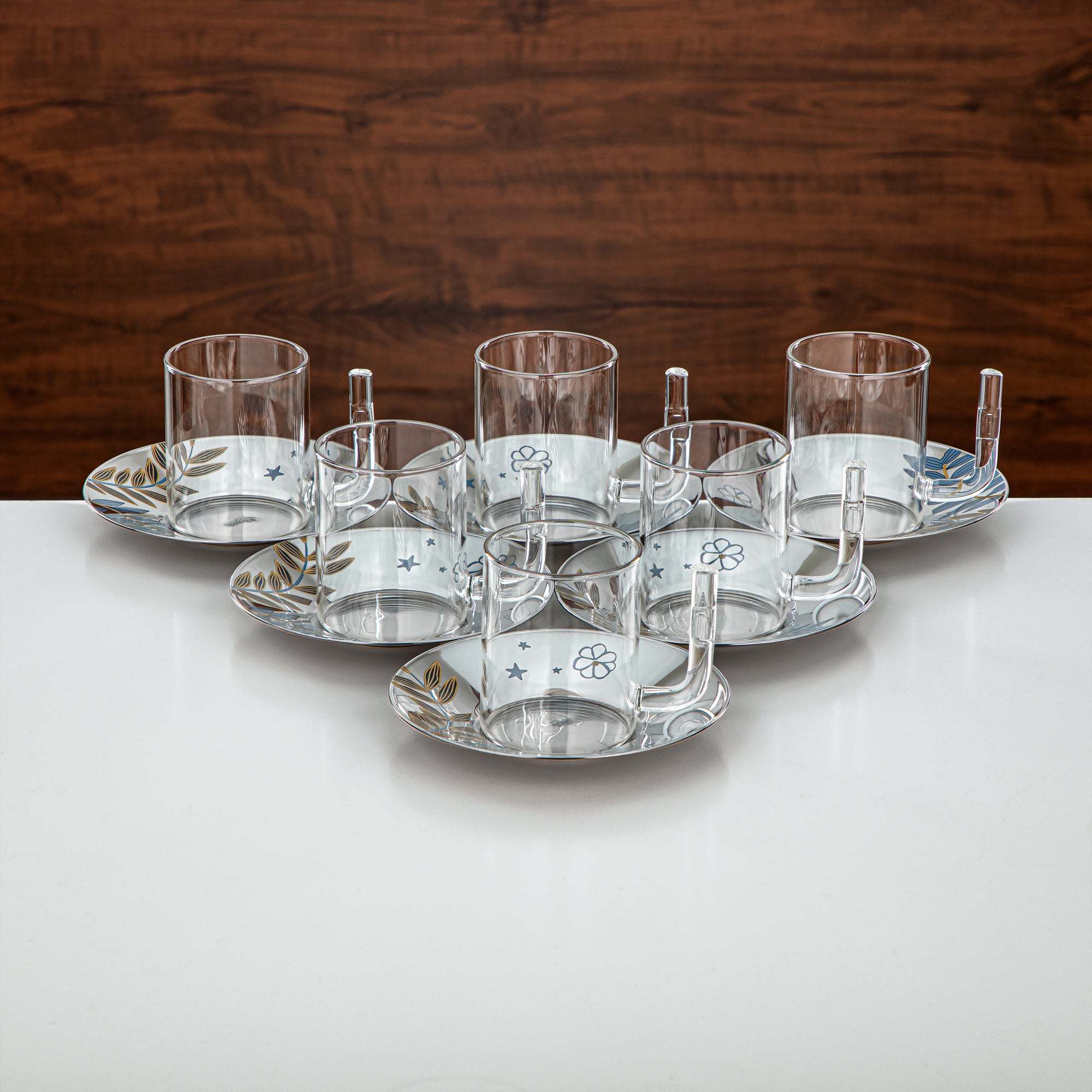 طقم ترمس المرجان وشاي مطفي فضي وذهبي قطعتان (1L + 1L) + طقم كاسات وأواني بورسلين أزرق بنقشة نباتية 18 قطعة – تقديم أنيق | مجموعة عصرية