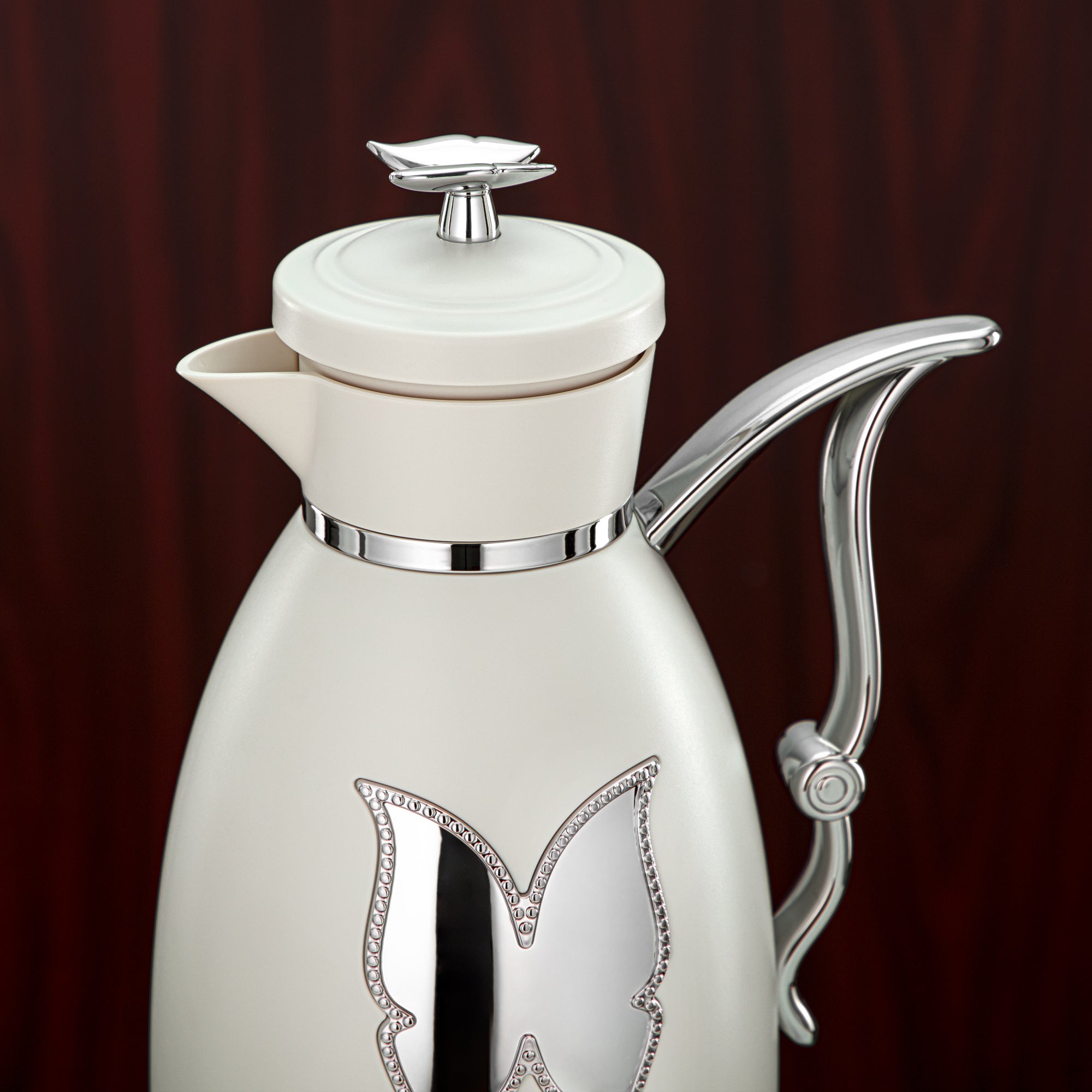 طقم ترامس المرجان بلاستيك زر ضغط 0.7 لتر + 1 لتر عاجي وفضي (SM-2C142-070/100 IV/C) - زجاجة شاي وقهوة